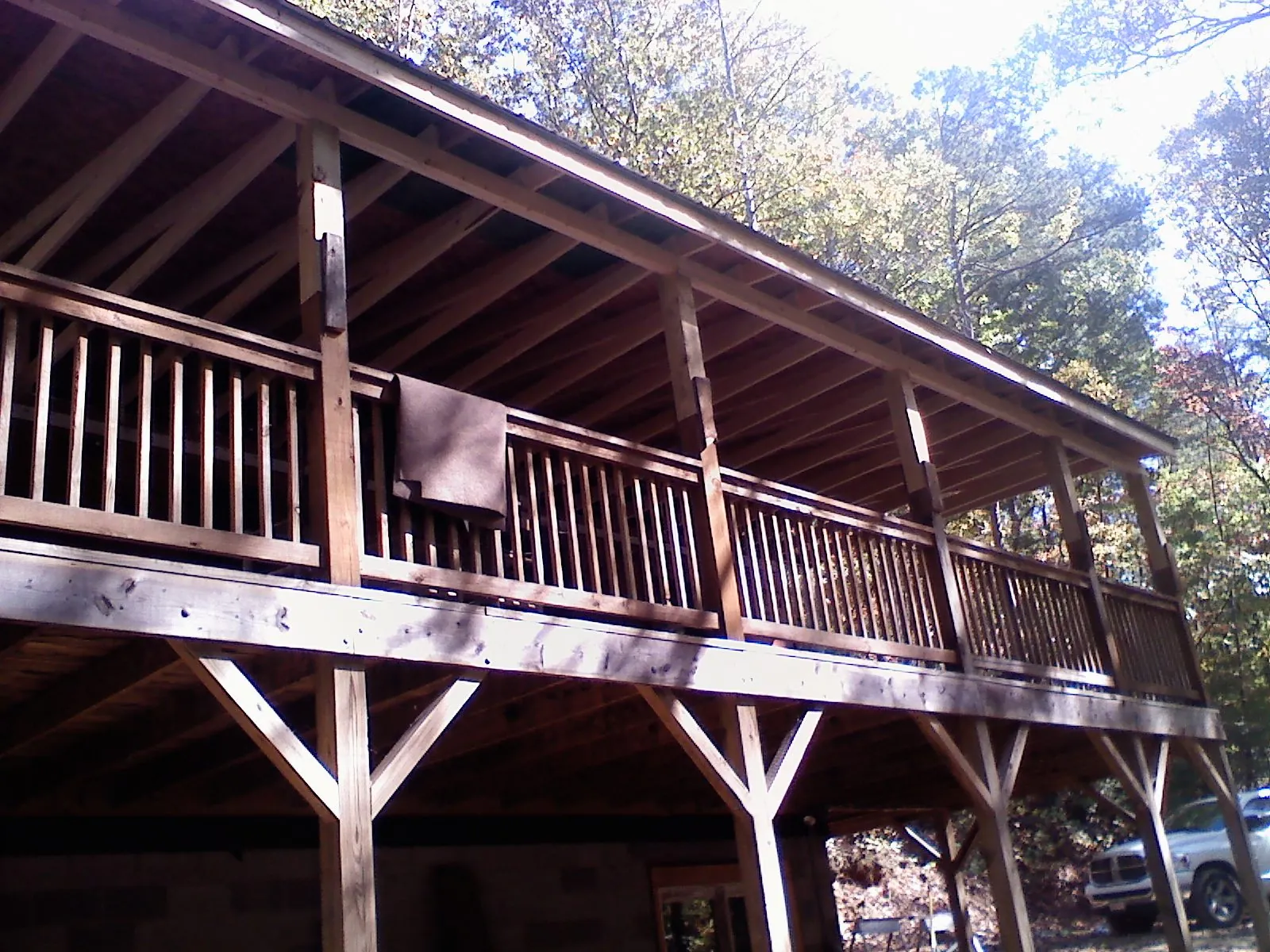 Timber framing under a new elevated porch and deck — Roof Leak Repair in Anaheim by Roofing Brothers